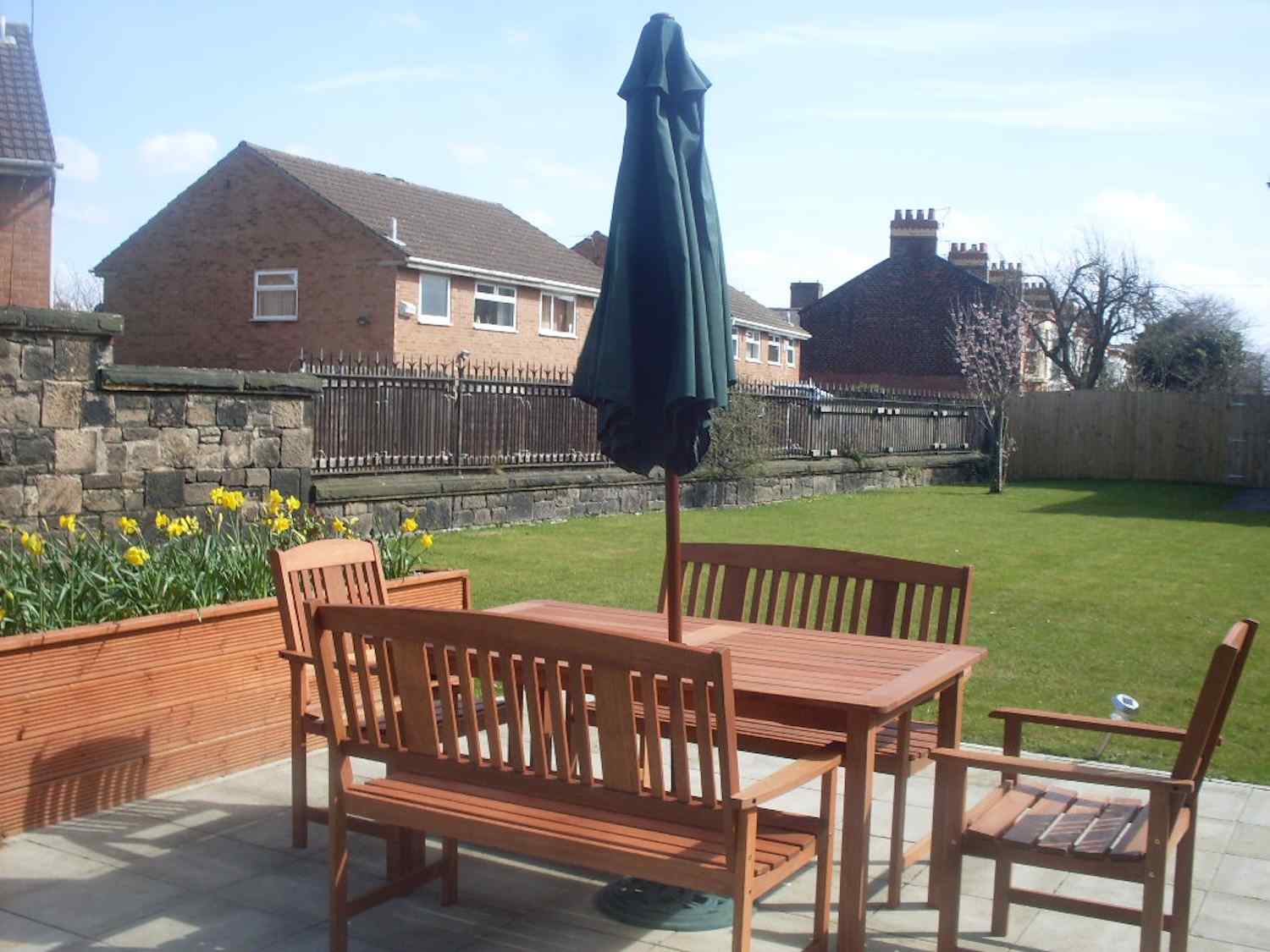 seating area with umbrella in our garden